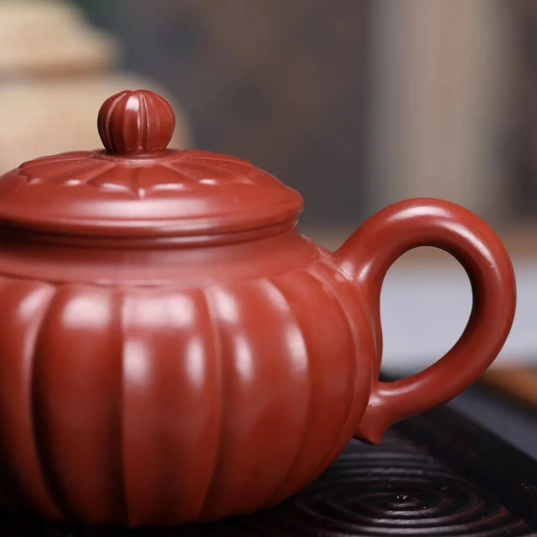 Yixing Zisha Teapot By A Famous Artisan Handcrafted From Natural Ore Featuring The Da Hong Pao Flower Bud Design Available Fo