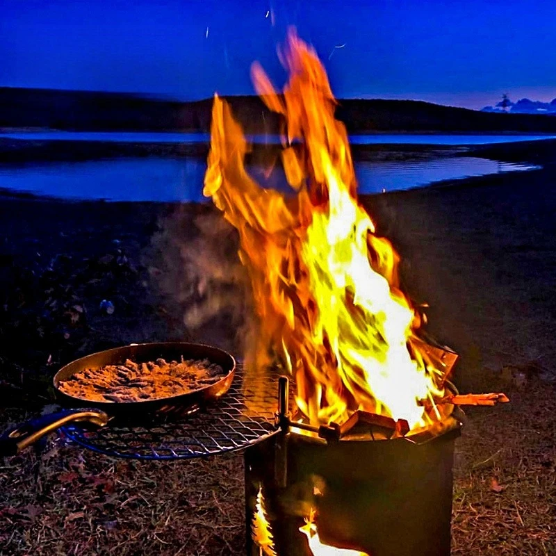 Outdoor camping camping bonfire barrel round roasting stove barbecue wood stove beacon barrel raw carbon heating stove wild