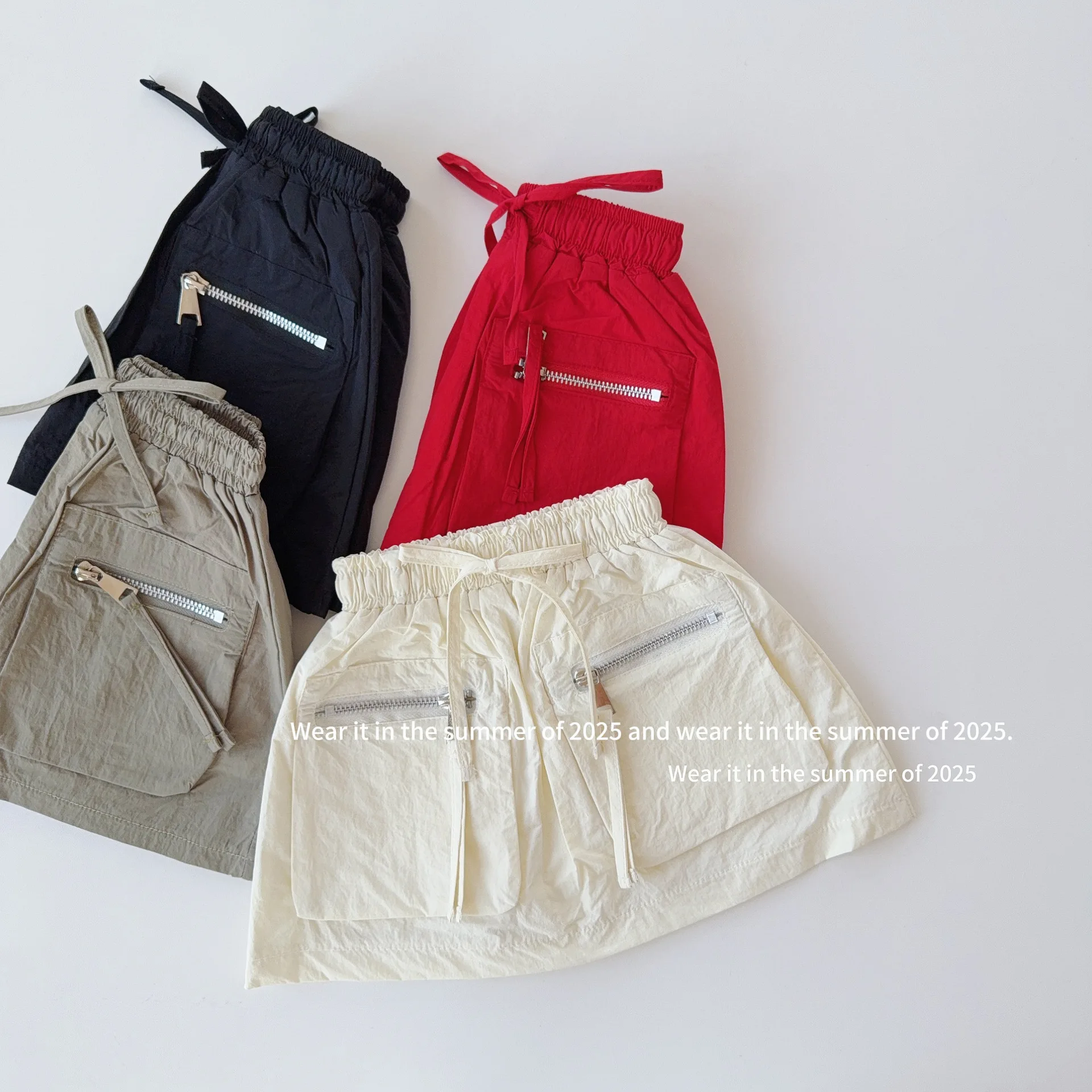 

2025 Summer New Children Skirts Fashion Girls Elastic Waist Cargo Skirt Solid Kids Zipper Pocket Skirts Baby Girl A-line Skirt