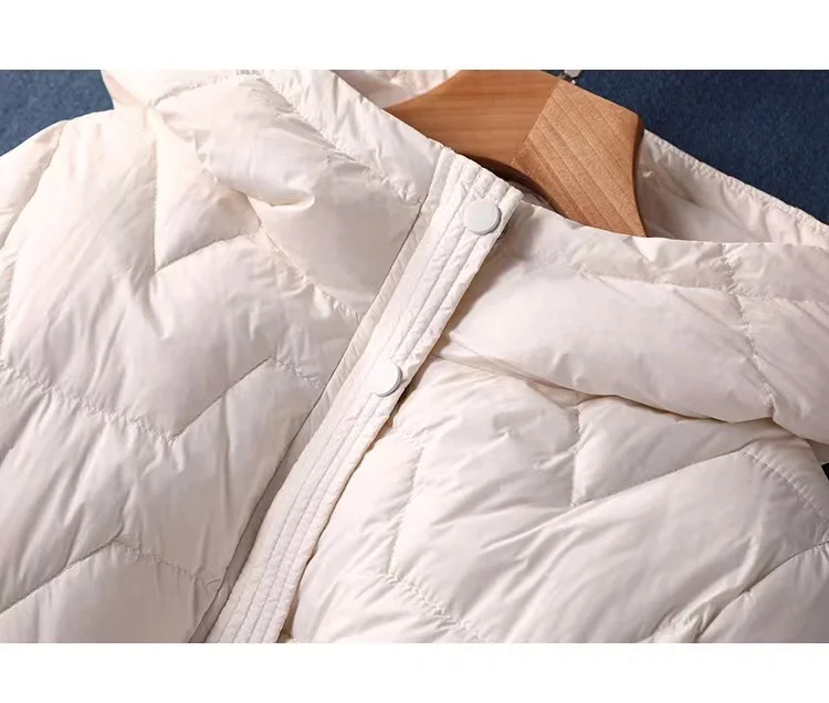 Abrigo de plumón de pato blanco para mujer, Parkas de moda, abrigos con capucha cálidos impermeables, chaquetas con cremallera en negro, blanco y