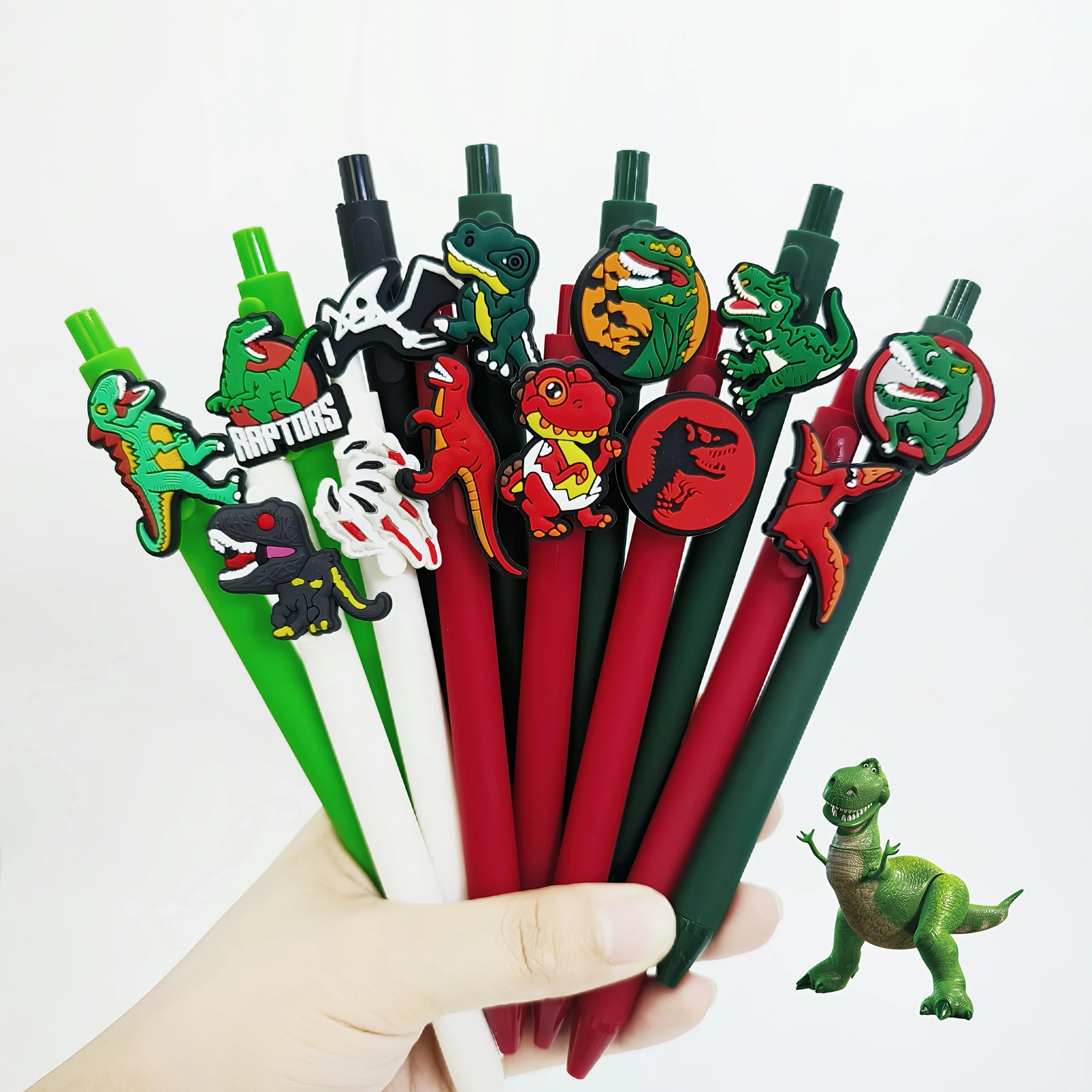 

12Pcs dinosaur series patch pen PVC soft patch ballpoint pen, student school season signature gift pen, random style