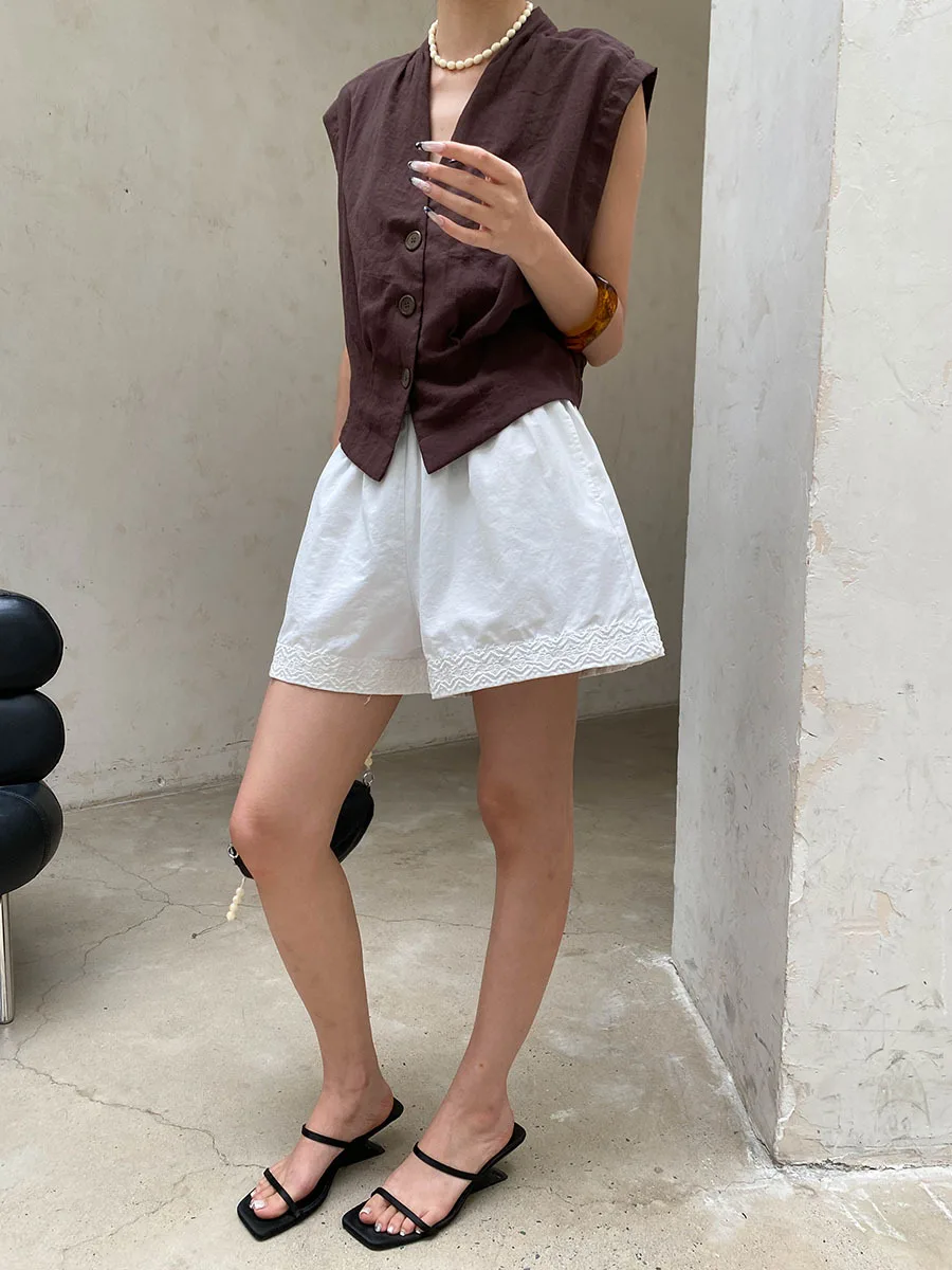 Sommerliche Damen-Shorts in unifarbenem Design mit elastischem Bund, besticktem Patchwork, lockerer Passform und weitem Bein. – Detail 4