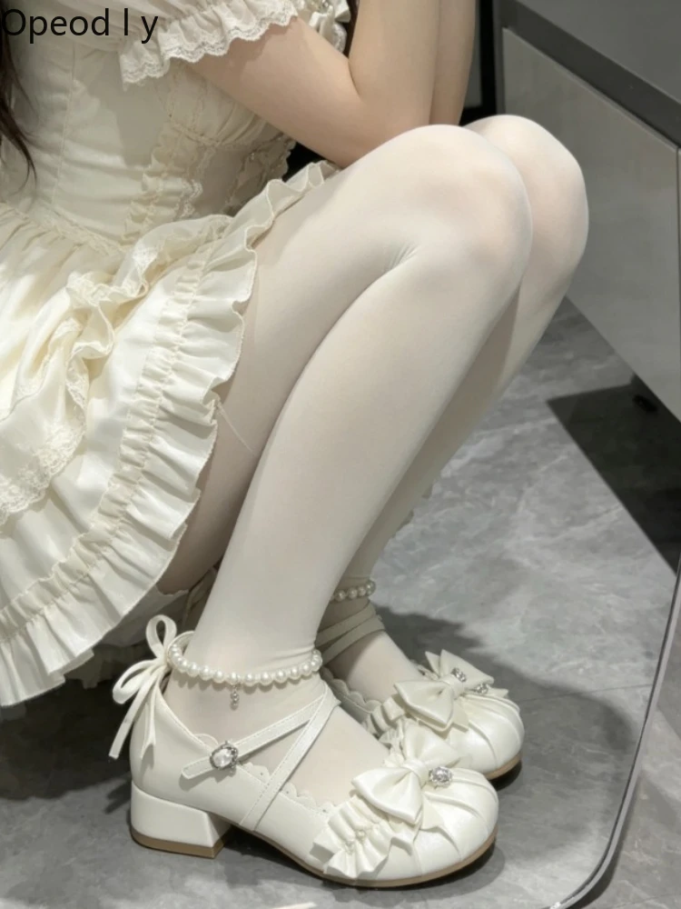 

Ancient feeling Japanese original lolita low-heeled single shoes retro elegant shell head thick heel bow versatile women's shoes