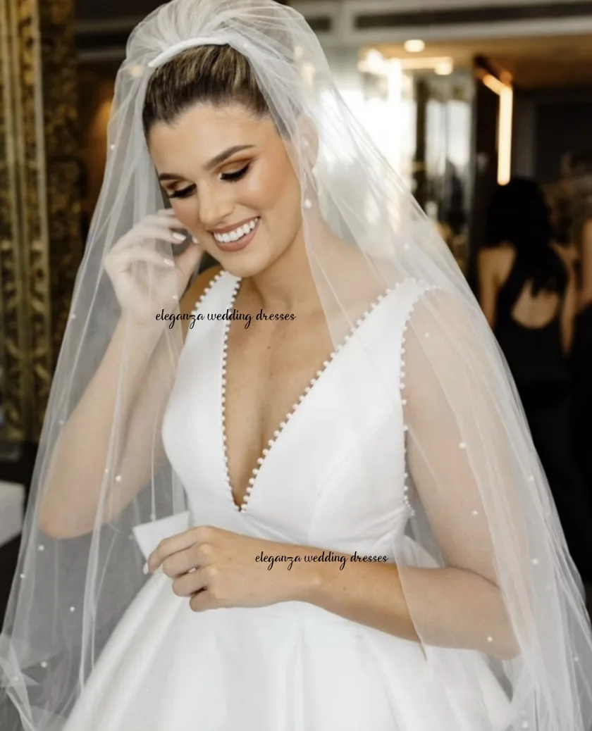 فساتين زفاف كلاسيكية مخصصة من الساتان للمرأة العروس على شكل حرف a على شكل حرف v بدون ظهر بفيونكة لؤلؤ شحن سريع فيستدو دي نوفيا