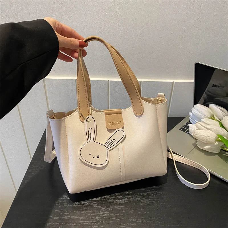 

Simple large capacity women's travel handbag fashionable cartoon pendant shoulder bag women's crossbody bag bolsos de mujerсумка