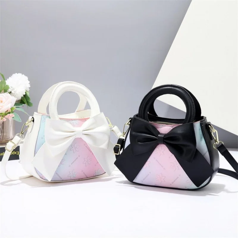 

Elegant Handle Bag With Metal Accents For Women For A Sophisticated Architectural Look