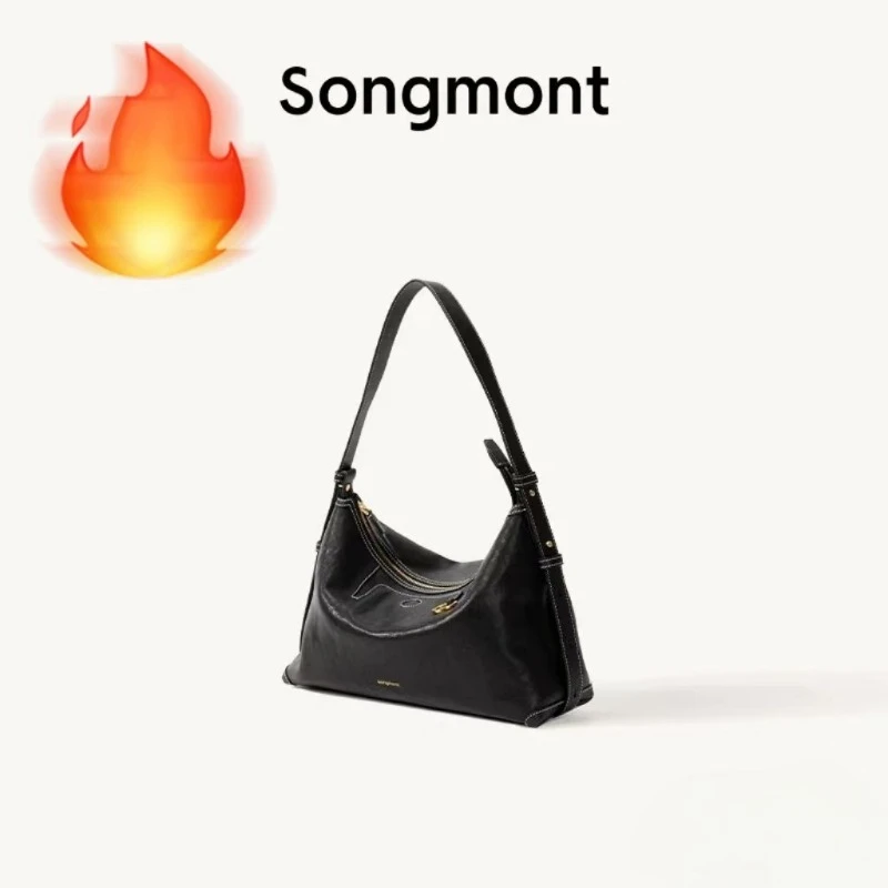 

Leather tanned crossbody bag with soft fabric. Large capacity, versatile design. Adjustable shoulder strap for different lengths