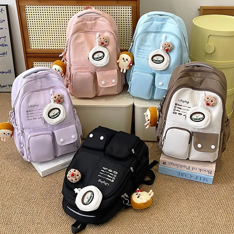 Mochila escolar Kawaii para estudiantes universitarios, morral de viaje ligero de gran capacidad con bonito colgante para adolescentes