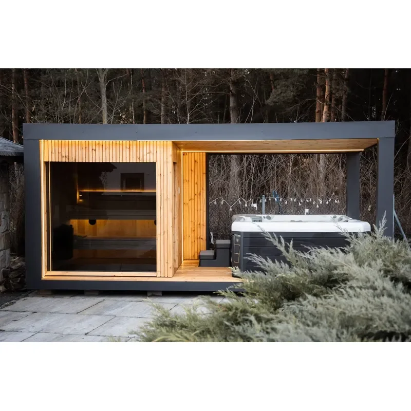 Modern outdoor sauna with integrated terrace and LED lighting, grey exterior, no bathtub