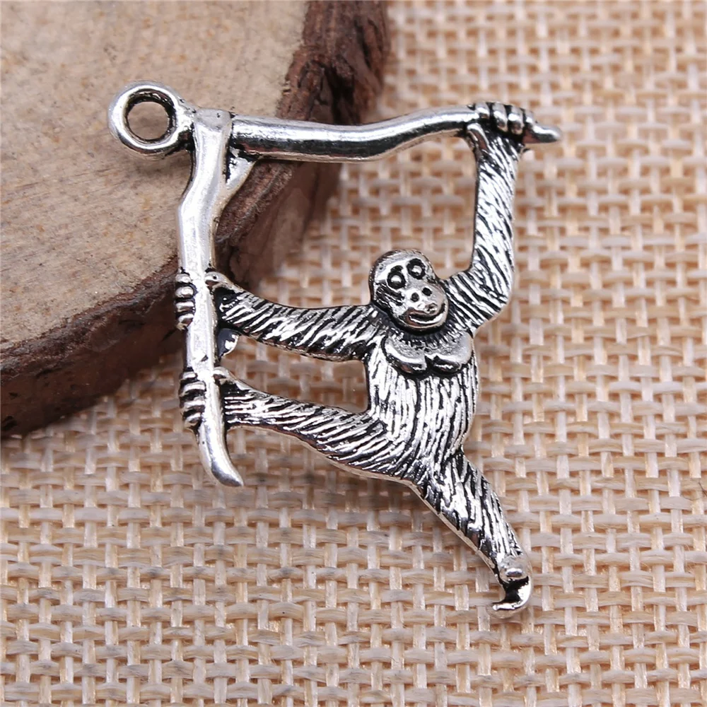 

Wholesale 60pcs/bag 39x32mm Animal Orangutan Monkey Pendant Charms Wholesale Monkey Pendants Charm Orangutan