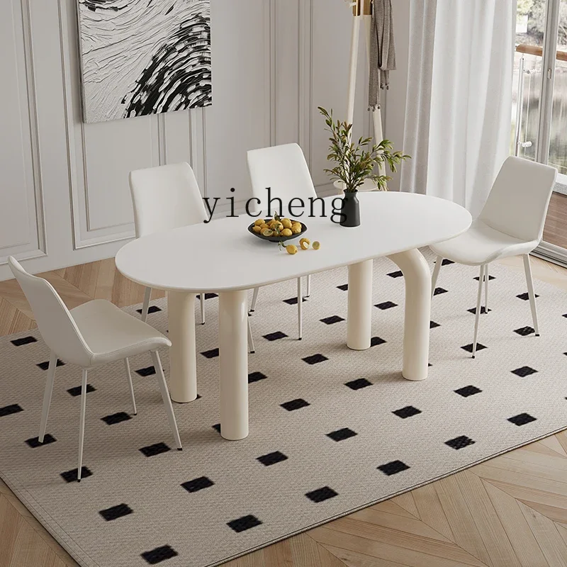 

AA rock slab dining table modern simple cream style dining table living room household oval dining table