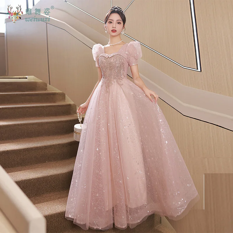 

Pink Sequined Beaded Mesh Embroidered Evening Gown with French Bubble Sleeves and Waist Cinching Evening Gown Quinceanera Dress