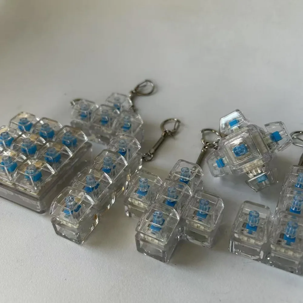 Entspannende 4/5 Tasten Finger Tastatur Stressabbau Taste Tastenkappe Dekompression Schlüsselbund Bestehen Sie die Zeit Gadget Clicker Spielzeug Erwachsene