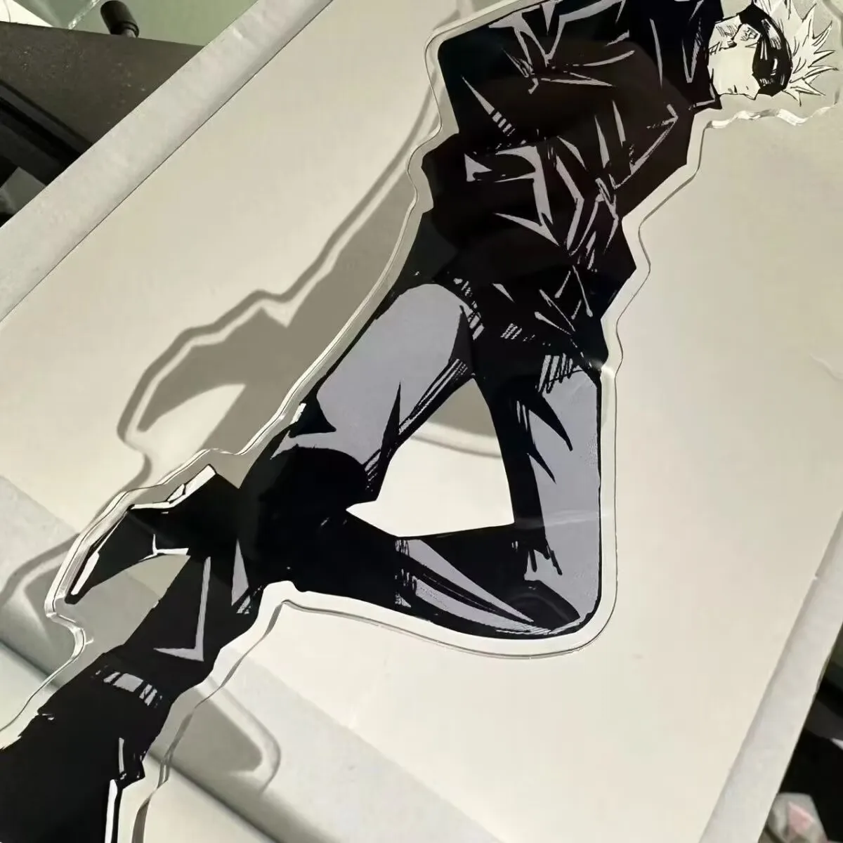 

A "Jujutsu Kaisen" themed acrylic desktop display "Satoru Gojo" sign from Xiaohongshu as a gift for your best friends