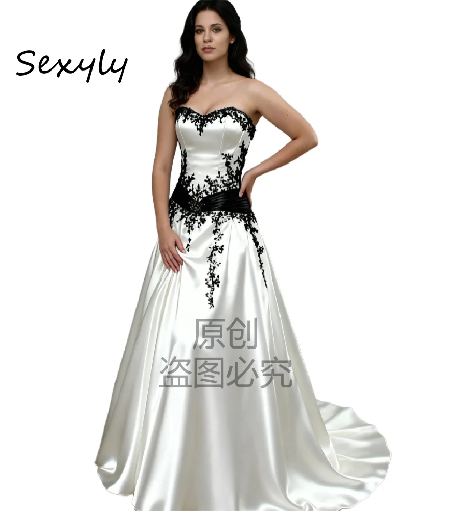 Vampier wit met zwart kant trouwjurk jaren 1950 Keltische zigeuner zacht satijnen bruidsjurk 2026 Sweetheart Beach Boho bruidjurk