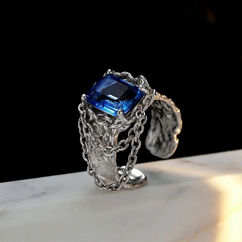 

Youth of Vigor Tassel Chained Chunky Irregular Solid 925 Silver Ring Blue Stone Alien Pattern Party Open Rings R1211