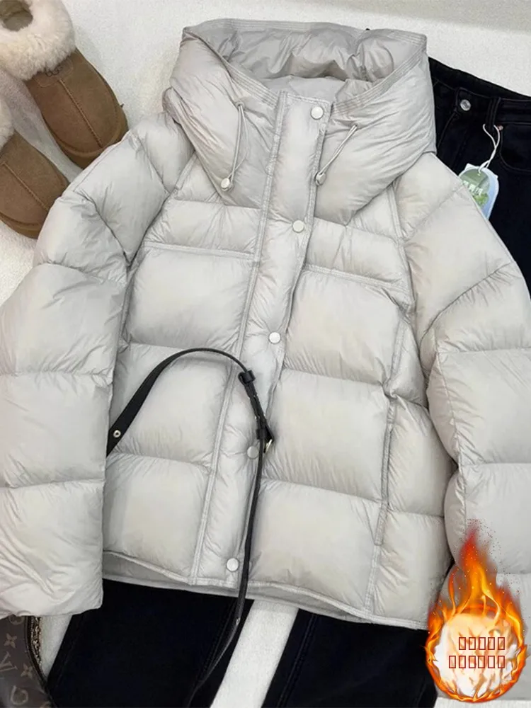 

Женская зимняя куртка 2026: Новая модная свободная утепленная теплая белая куртка с капюшоном из хлопка для женщин