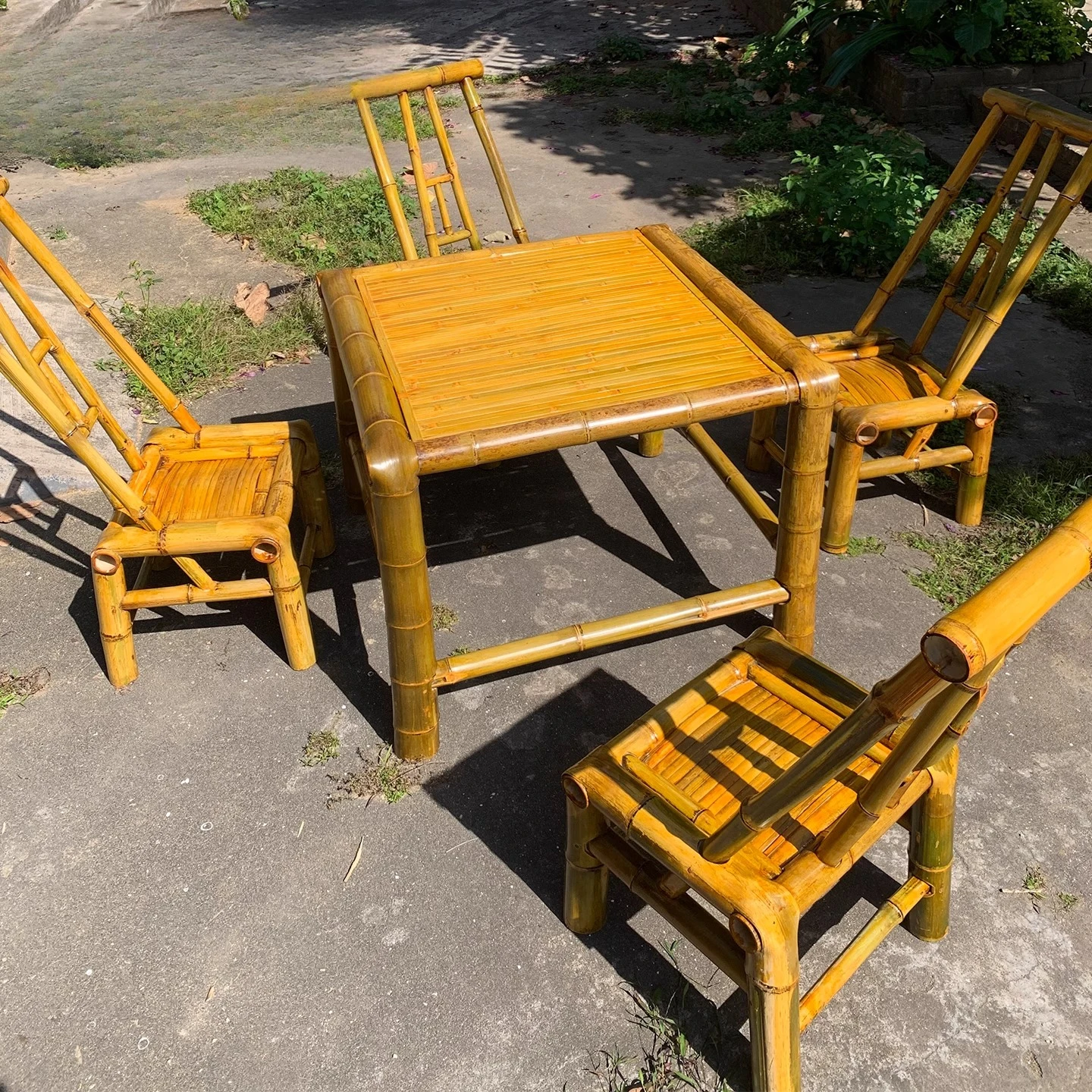 

Outdoor courtyard bamboo table and chair combination, surrounding stove tea bamboo chair table Baxian table is rectangular