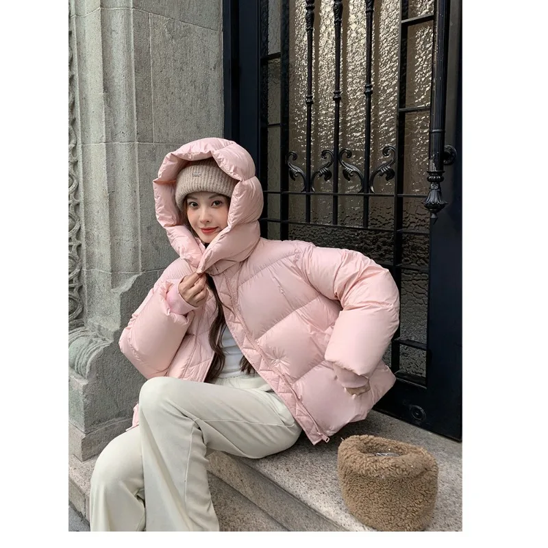 Verdikte donsjas 2025, winter nieuwe high-end mode, bladerdeegbroodpak met capuchon, losse effen damesdonsjas