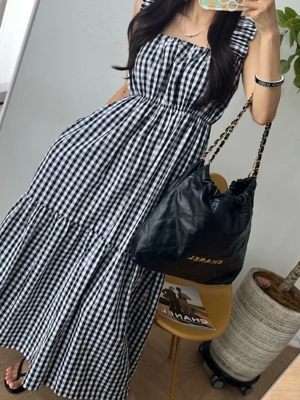 فستان منقوش باللونين الأبيض والأسود بدون حمالات للنساء بخصر فضفاض تنورة متوسطة الطول لربيع الخريف موسم الخريف منتج صيني بدون ...