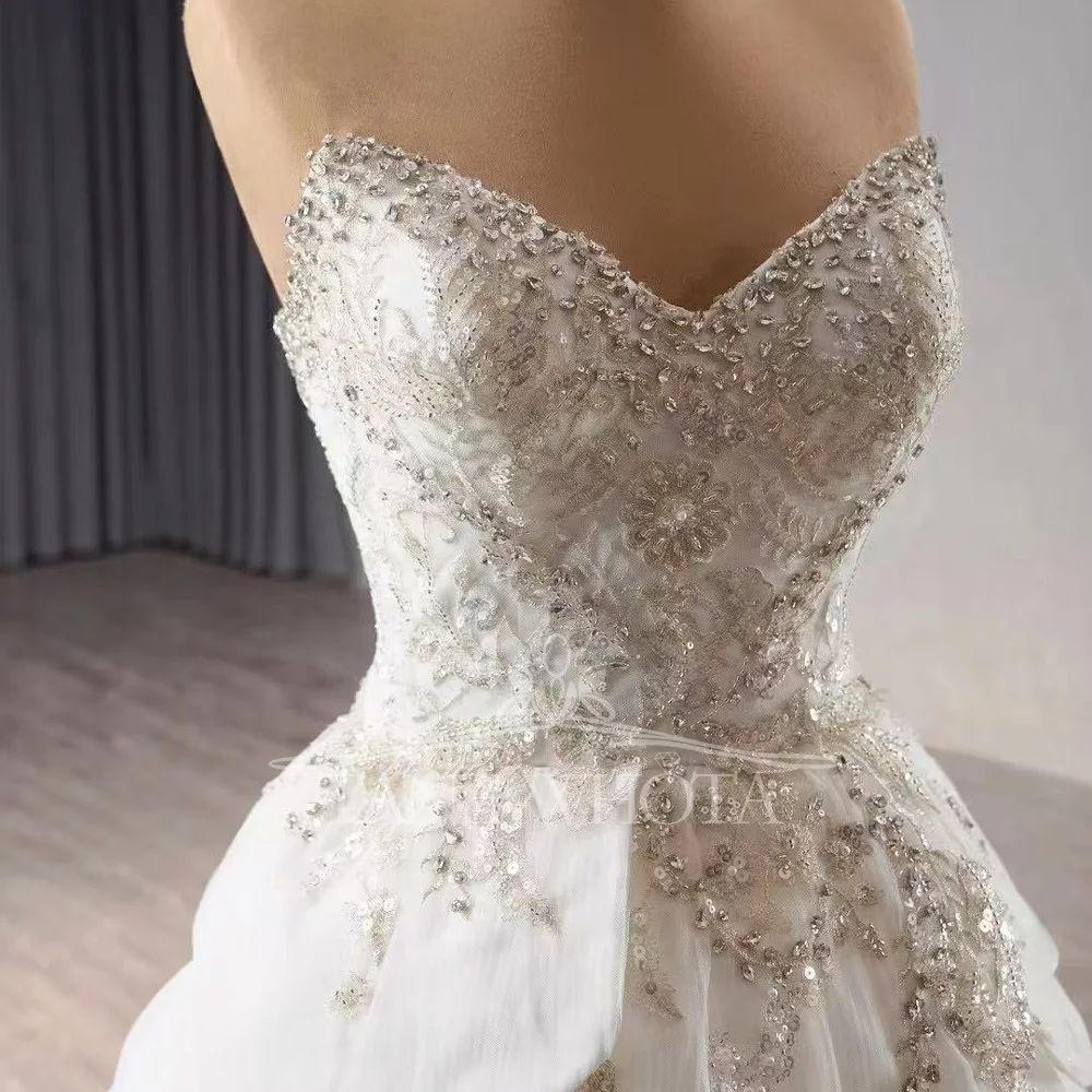 Abito da sposa di lusso con paillettes sul retro con lacci in cristallo senza maniche con scollo a cuore Abiti Da Sposa personalizzabile