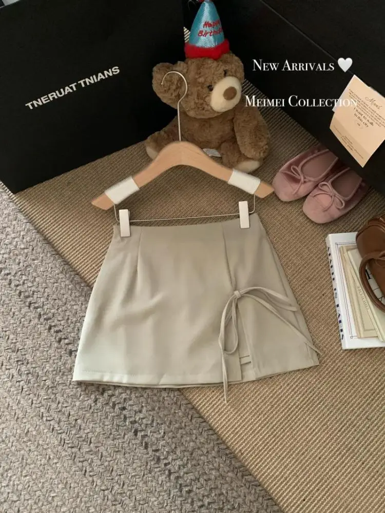 

Французская женская однотонная элегантная сексуальная клубная мини-юбка на шнуровке с бантом, весна-лето, тонкая универсальная короткая юбка трапециевидной формы с высокой талией на молнии