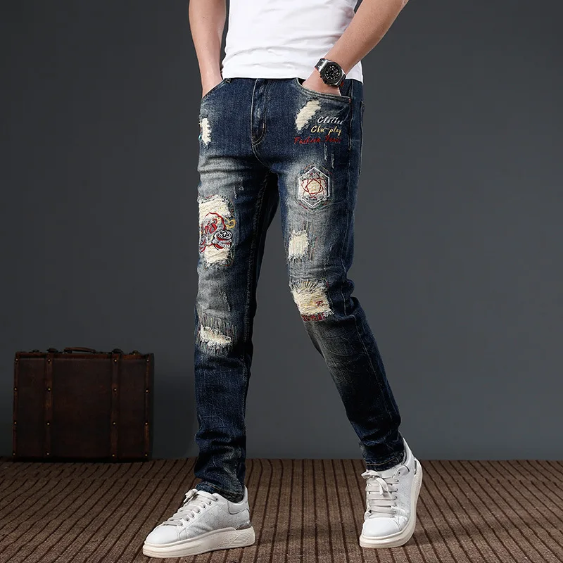 

2024 New Trendy Patch Perforated Embroidered Jeans for Men's Deep Blue Slim Fit Small Feet Street Motorcycle Denim Pants