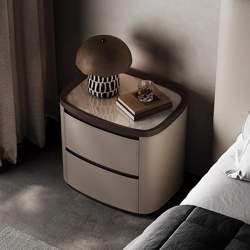

Italian minimalist bedside table light luxury simple modern high-end leather bedside table bedroom new rock slab storage cabinet