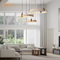 Artistic high-end natural yellow cave stone circular pendant light LED modern minimalist living room home decoration lighting