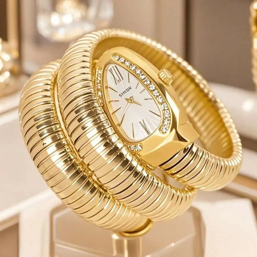 

Элегантные золотистые часы с ремешком в виде змеиной спирали, кристаллами и римским циферблатом