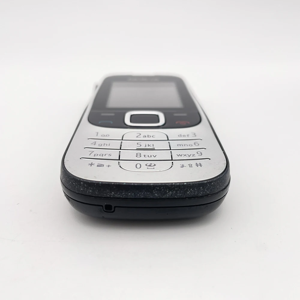 هاتف Nokia 2330 الكلاسيكي الأصلي المصنوع في فنلندا يدعم اللغة الإنجليزية بحالة جيدة فقط