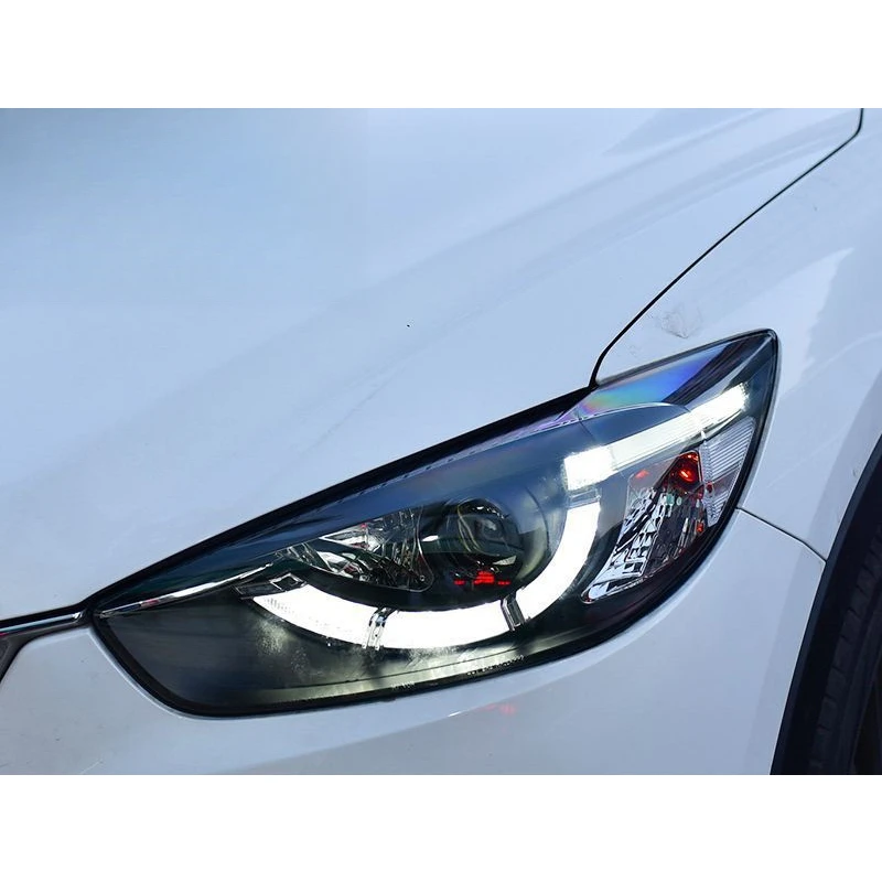 

Подходит для модификации экстерьера автомобиля Mazda CX-5 - Светодиодные фары DRL в стиле Spoon с биксеноновыми проекторами, комплект левая и правая (пара)