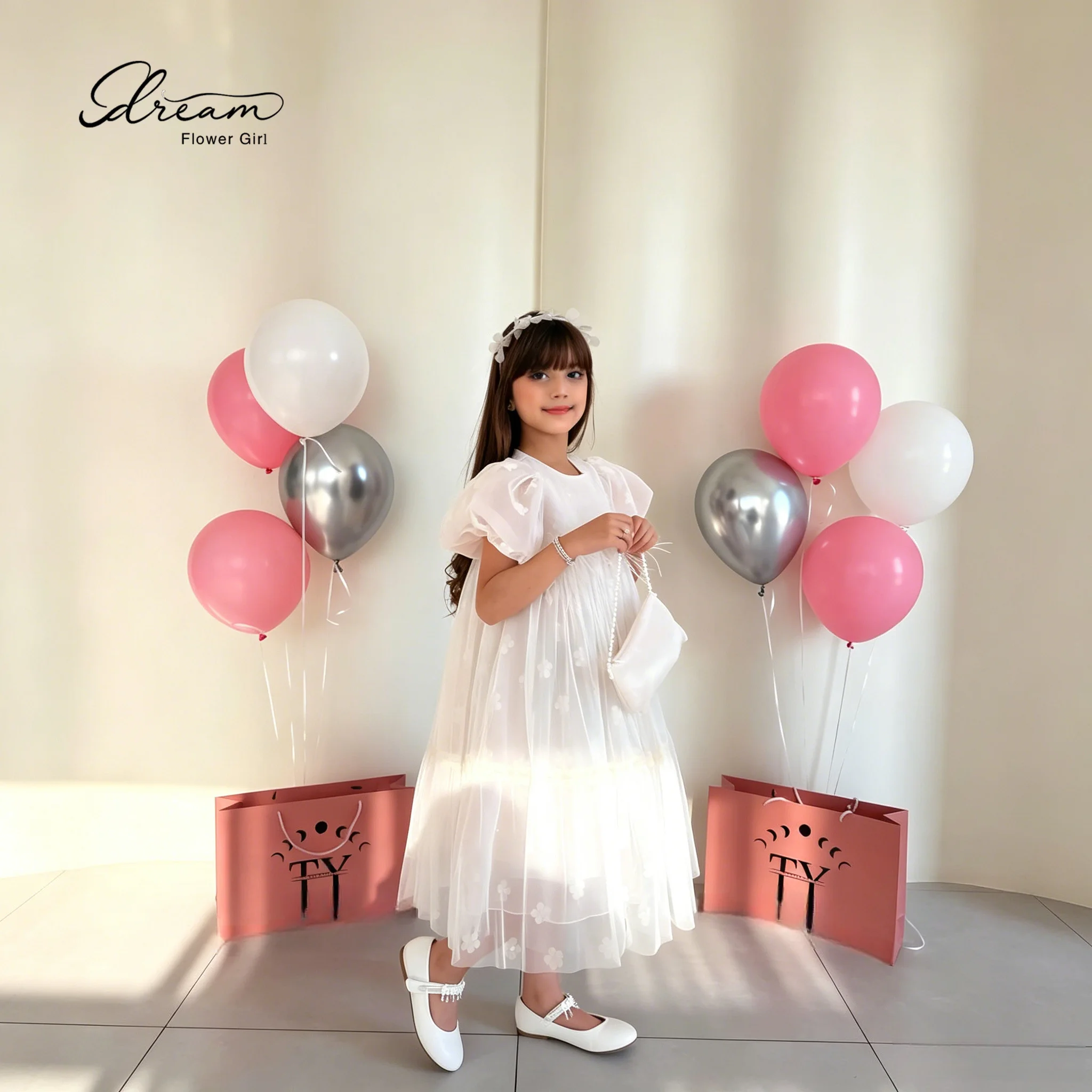 

The white long dress of the lovely girl features a round neckline, paired with ruffled puff sleeves and a fluffy skirt.