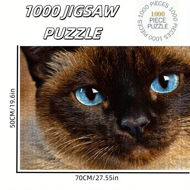 تتميز ألغاز ورقية مكونة من 1000 قطعة من قطة سيامية مقربة بعيون زرقاء، مصنوعة من الورق المقوى الأبيض عالي الجودة. إنه الأداء