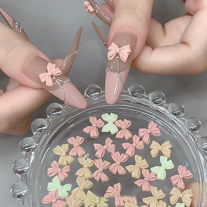 100 قطعة مزيج كريم نمط Bowknot مسمار السحر ثلاثية الأبعاد أورورا القوس شقة الظهر الأحجار الكريمة أجزاء مسمار الفن مانيكير الزينة