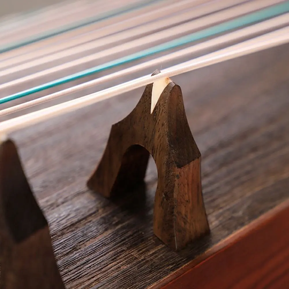 21 púas de madera de alta calidad para guzheng, puentes para reparación de cítaras, mejora la calidad del tono, ligeros y portátiles, para instrumentos musicales.