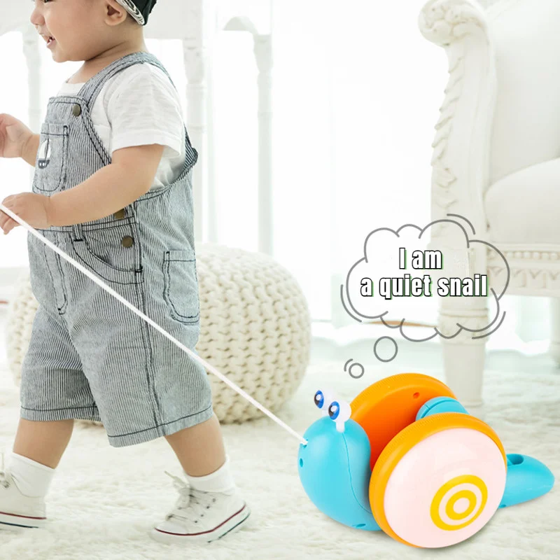 

Novelty Drawstring Snail With Light And Music Baby Learn To Walk Pull String Early Educational Toys For Children Toddlers 1-3Y