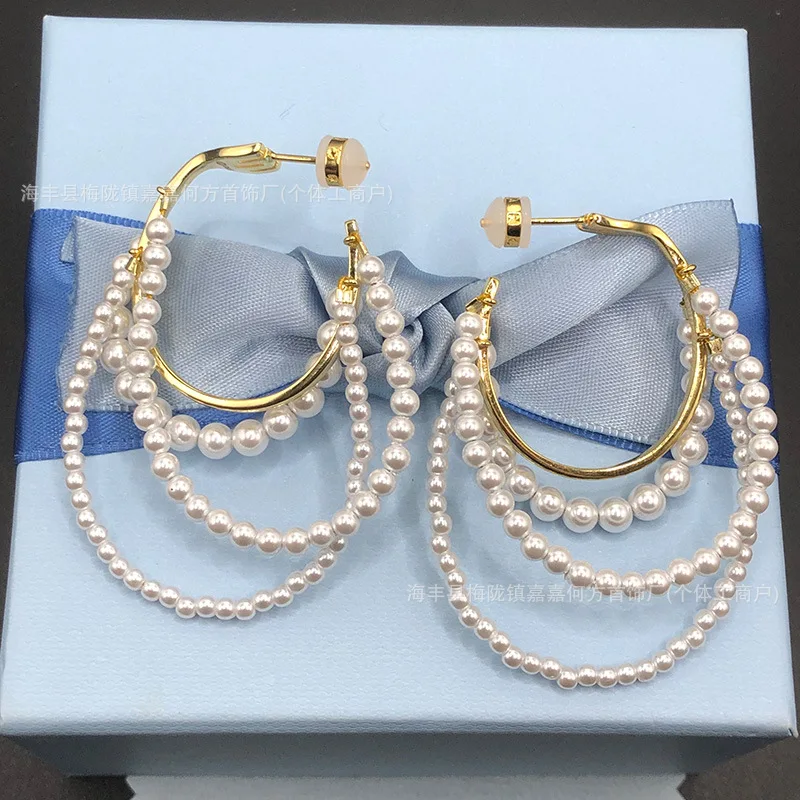 

Light luxury fashion texture Circle pearl earrings niche design sense exaggerated personality earrings women high jewelry