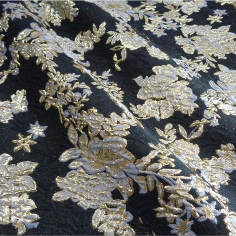 Black jacquard with gold thread flowers and embossed a broad puffy skirt fabric
