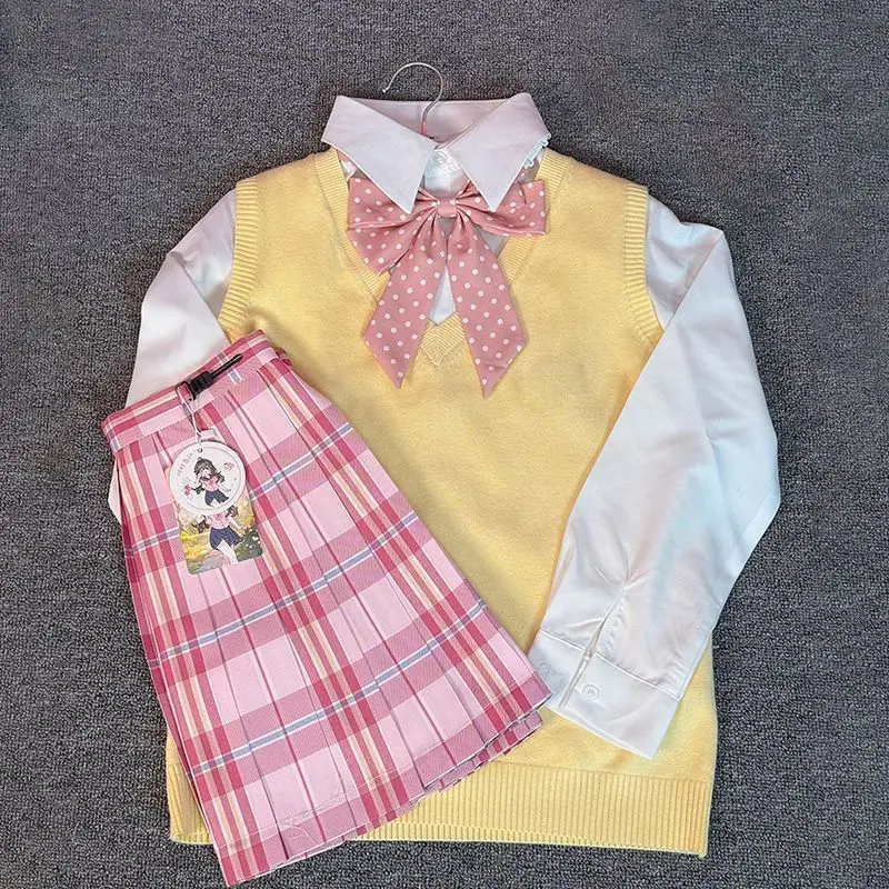 

College Sle JK orm Vest Tee-Piece Set Pure Desire Faion Plaid Skirt ort Sve V-Ne Vest Top And Bot Ensemble