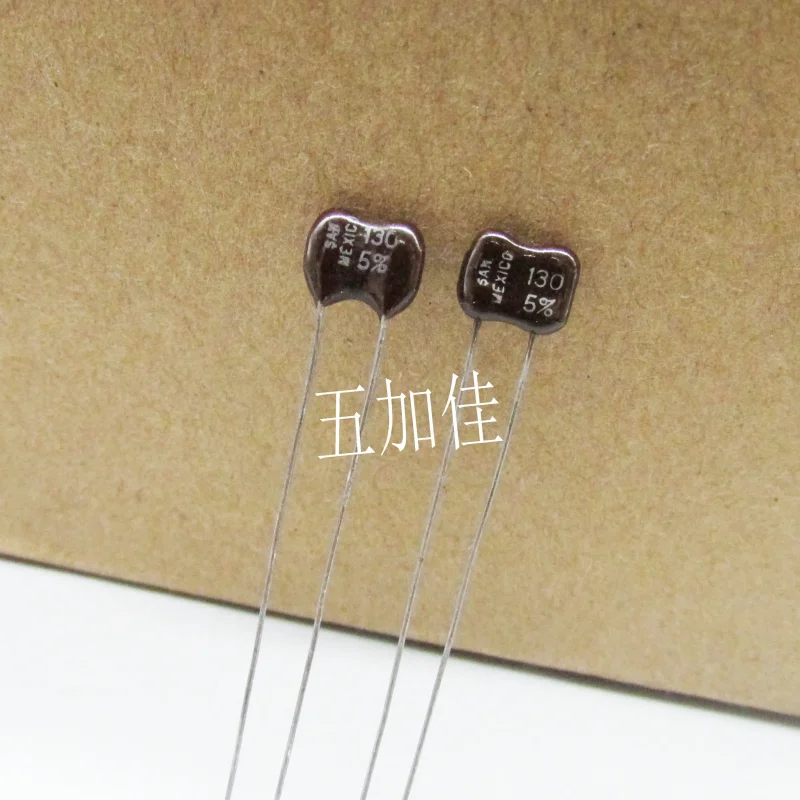 10-100pcs imported from Mexico 500V130PF 5% SAN fever audio silver mica capacitor with pin spacing of 4mm