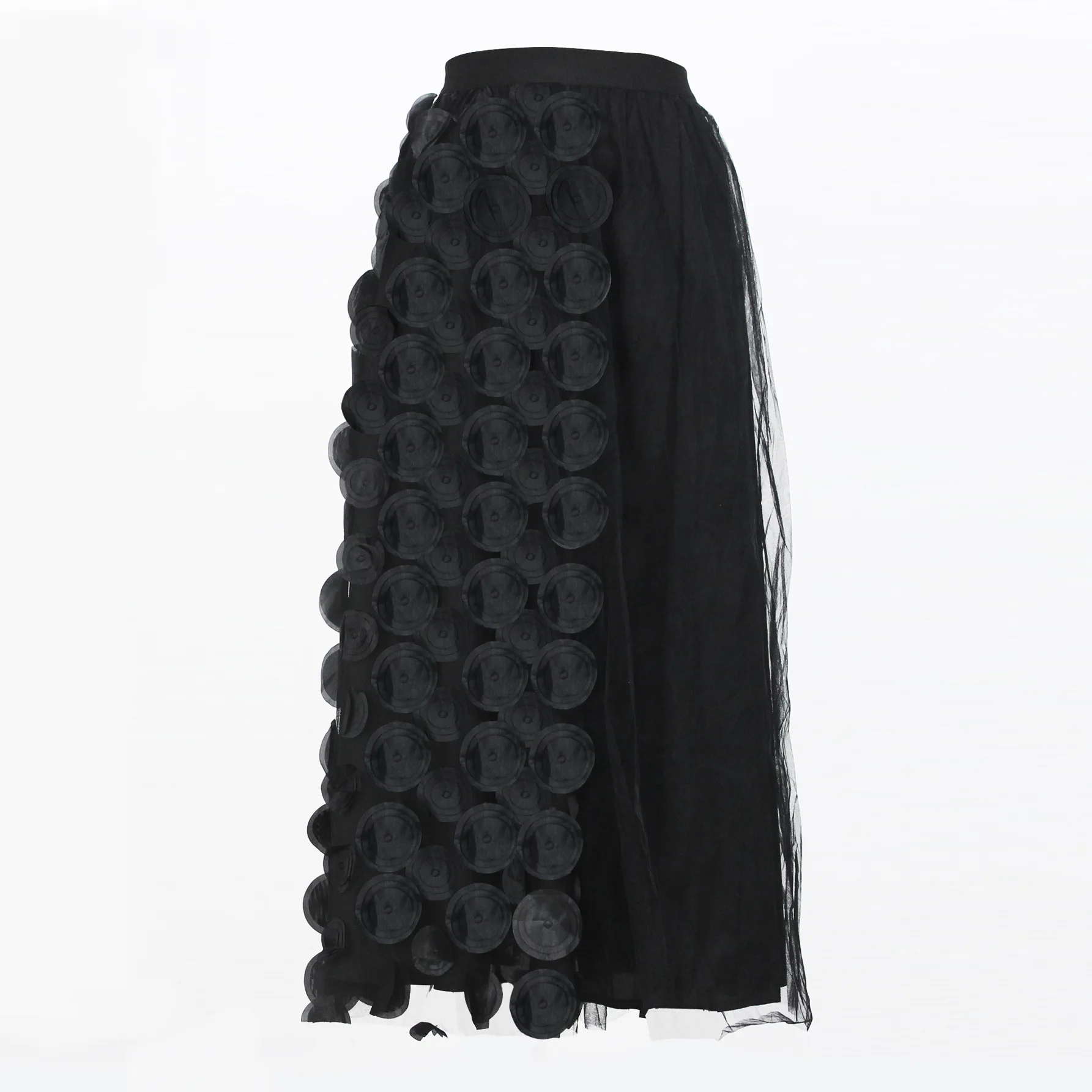 Long solid-color midi skirt with three-dimensional decorative patches and spliced mesh fabric