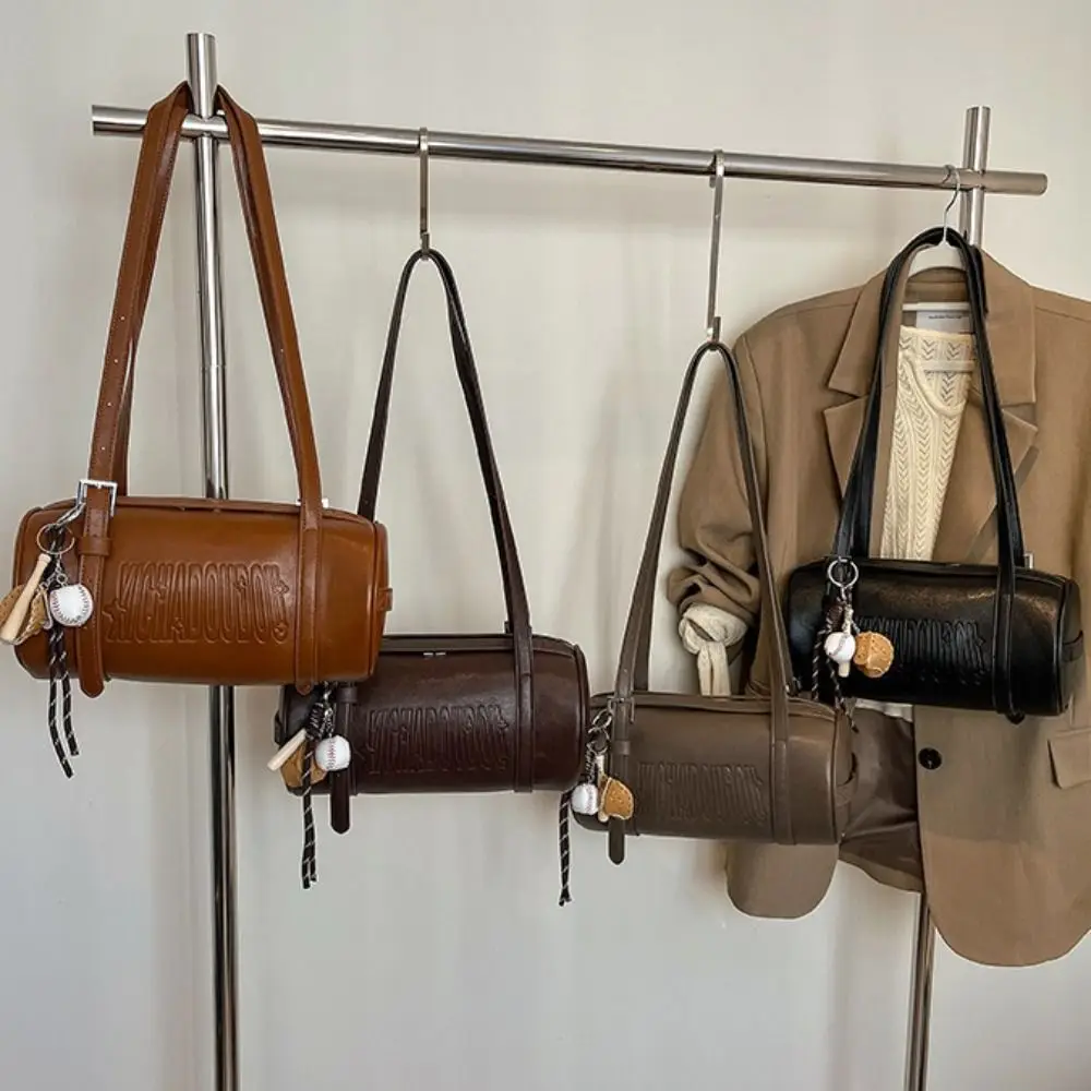 Latest Designer Cylinder Shaped Shoulder Bag With Pendant Solid Color Crossbody Bag Multifunctional Women Backpack