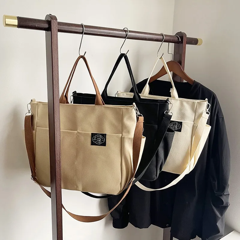 Ladies' fashionable and artistic thick tote canvas college computer simple handheld shoulder crossbody bag