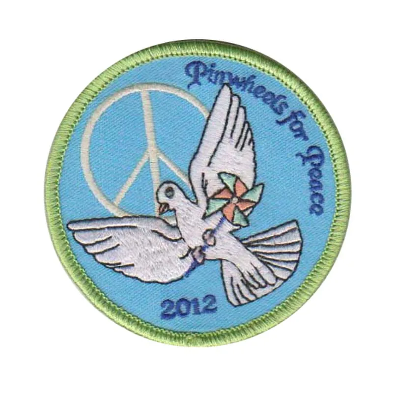 Lencana Bordir Pinwheels for Peace, mempromosikan aktivitas perdamaian, memperingati, dan menyebarkan konsep perdamaian