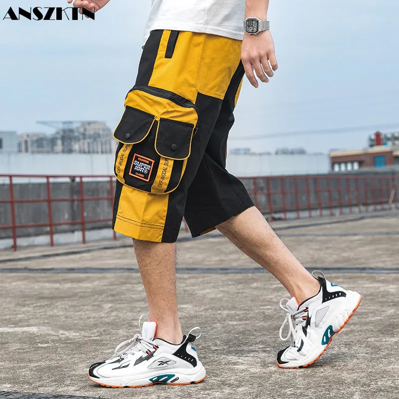 ANSZKTN Summer men's seven division of labor dress pants a hundred overalls multi-mouth bag short pants