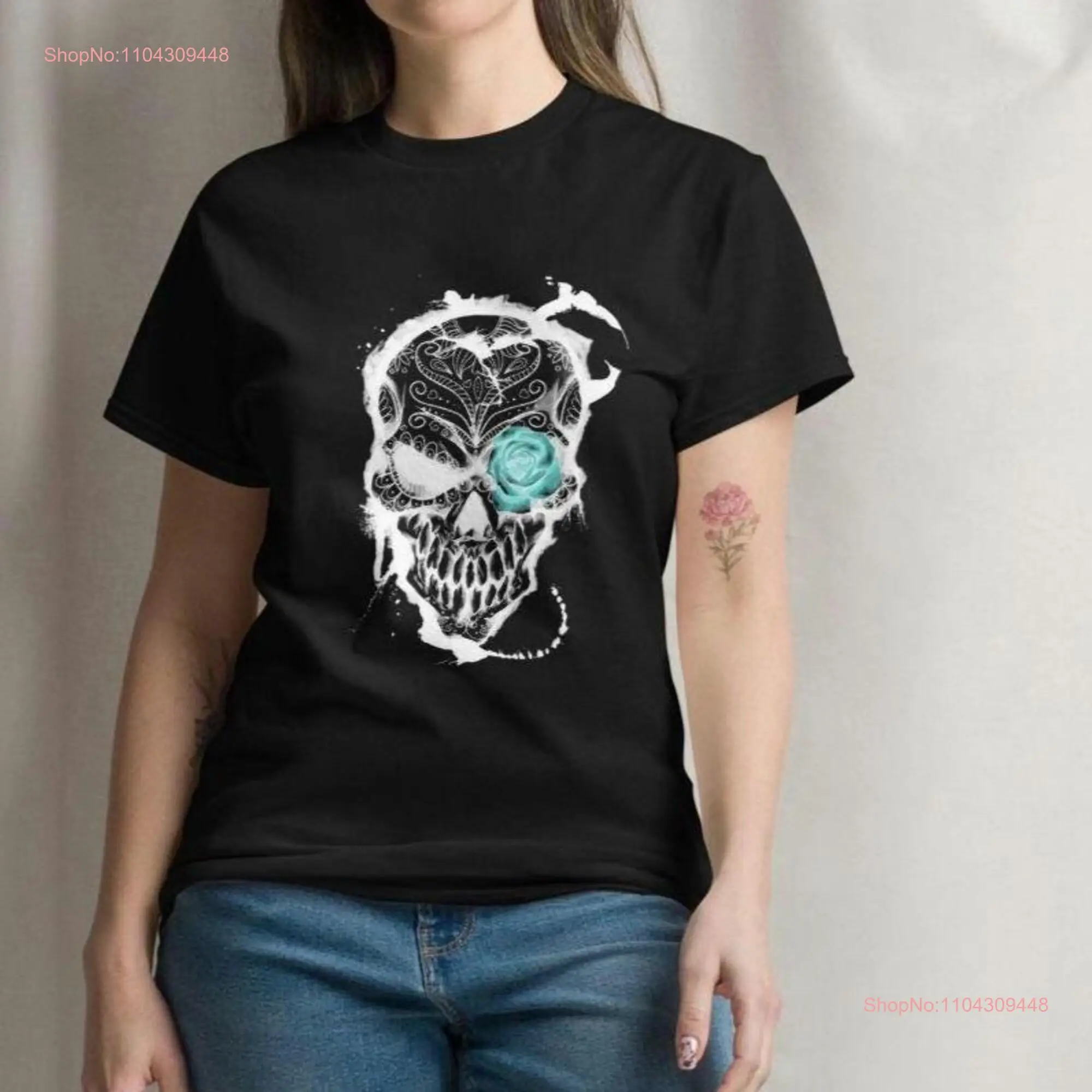 Intricate Skull Art T Shirt with Blue Rose and Ornate White Designs on Black Background for Gothic Halloween Style