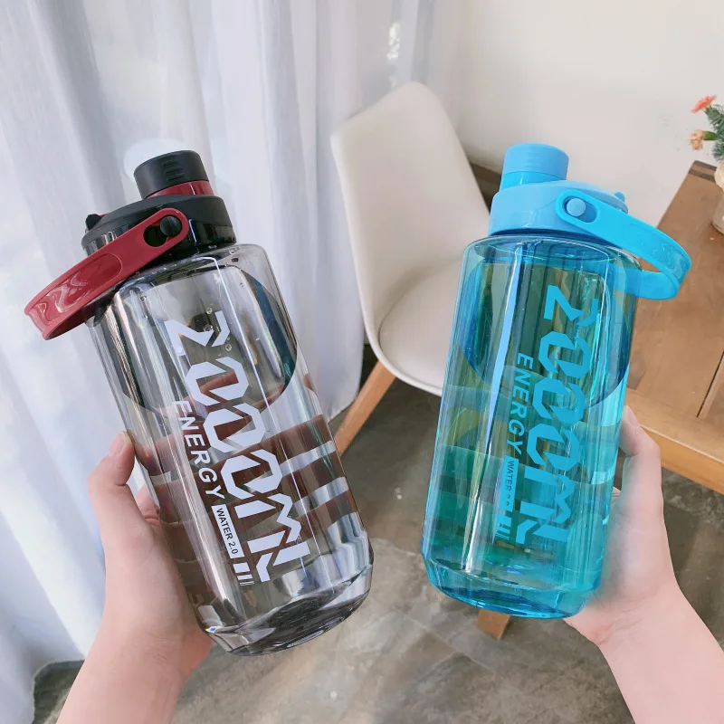 

Large Capacity Sports Bottles Plastic Water Cup Outdoor Fitness Sports Belt Handle Summer Explosion Proof Space Cup