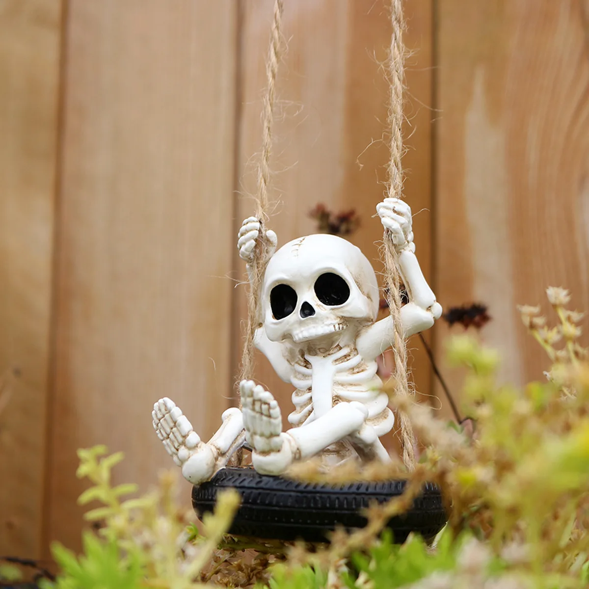 

Gothic Tire Skeleton - Weatherproof Hanging Decor for Haunted Gardens