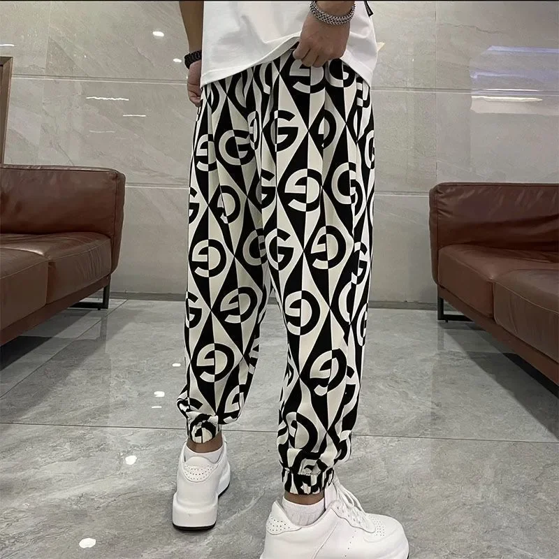 سراويل غير رسمية سريعة الجفاف ملونة جديدة للربيع والصيف للرجال، ملابس عصرية